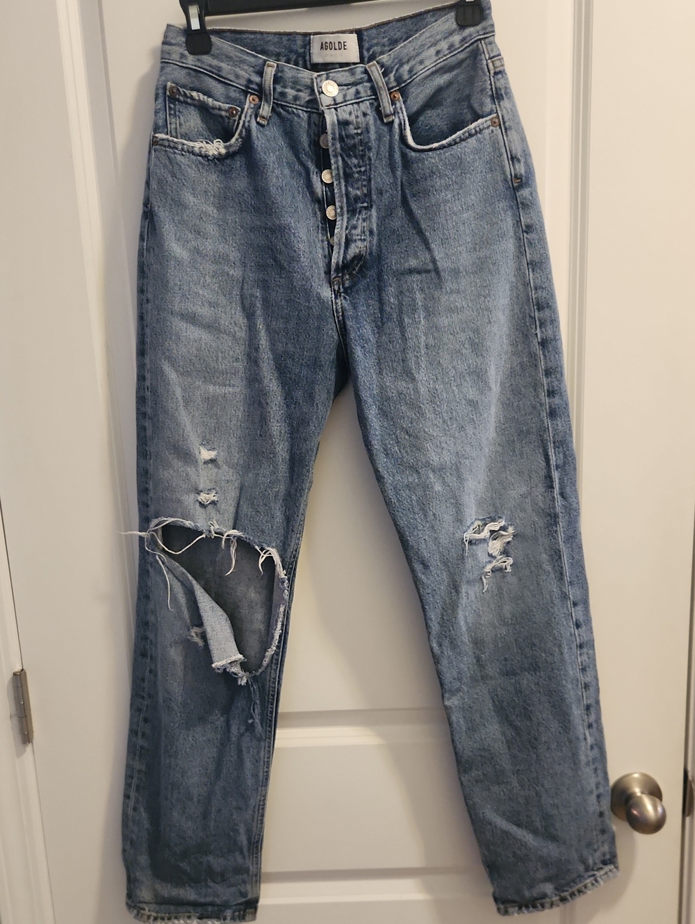 AGOLDE Light Blue Distressed Button-Fly Jeans Revolve Aritzia Anthropologie
